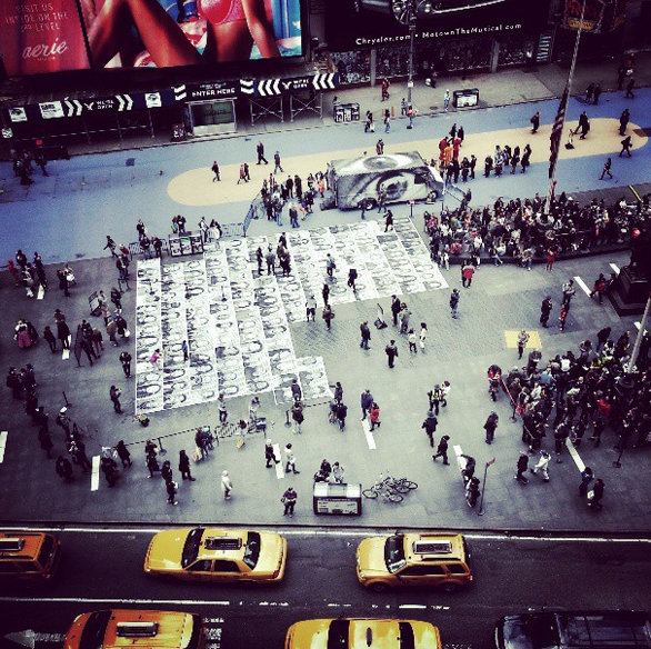 An arial shot as more and more people paste their Inside Out images in the center of Times Square. Photo: Instagram.com/jr/