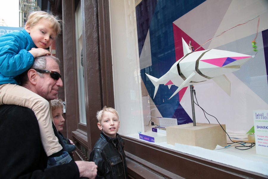 Kids marvel at a moving shark, powered by littleBits. Photo: courtesy of Ayah Bdeir
