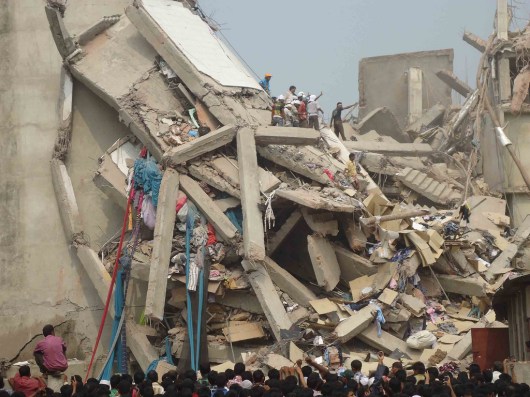 An eight-story building named Rana Plaza in the Savar neighborhood on the outskirts of Dhaka collapsed at 9am on Wednesday, April 24, 2013. Hundreds of workers were killed, and many more were trapped for days under the rubble until rescued with severe injuries. Photo: Institute for Global Labour and Human Rights.