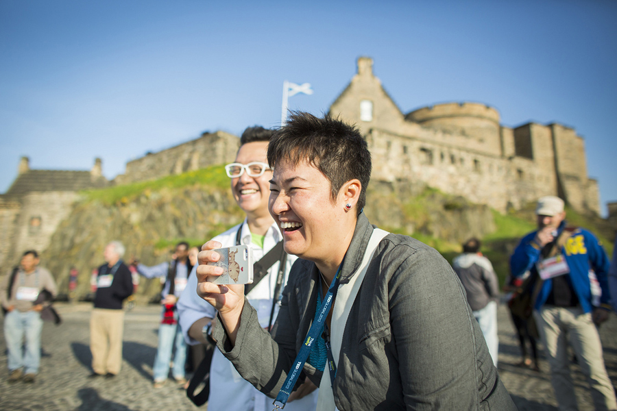 Attendees enjoy themselves outside Edinburgh Castle. Photo: Ryan Lash