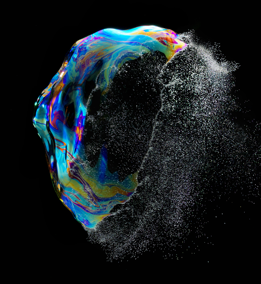 Iridient No. 03 (2012) A floating soap bubble is captured at the moment it bursts, and surface tension is broken. 
