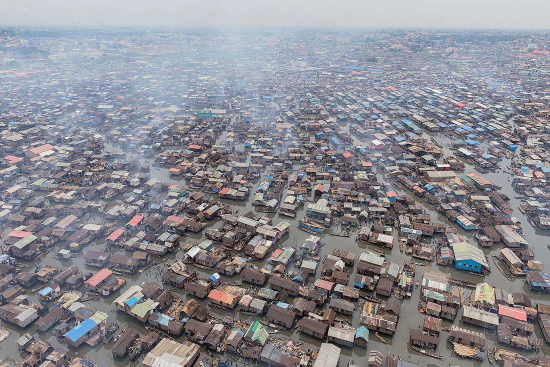 In the centre of Lagos is Makoko – a community of approximately one hundred and fifty thousand who live and work on stilted structures, just meters above the Lagos Lagoon. 