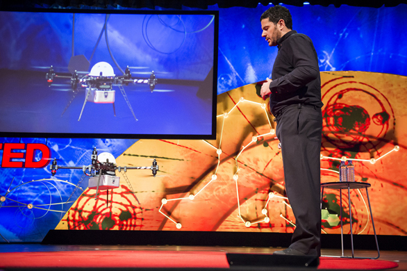 Andreas Raptopoulos of Matternet watches one of the company's drone land on the TED stage. Photo: James Duncan Davidson