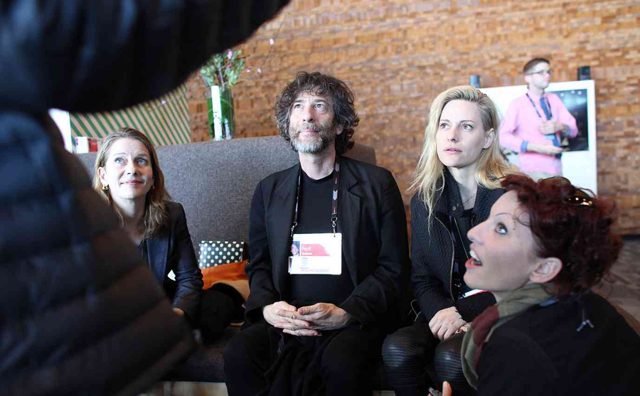 By daylight, Neil Gaiman is captivated by someone else's story at TED2014. Photo: Ryan Lash