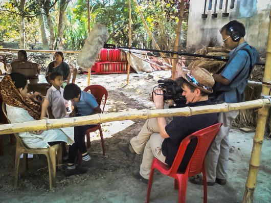 Filmmaker Jerry Rothwell films a family in Korakati, India. He is making a documentary that tells the story of the School in the Cloud. Photo: Courtesy of Jerry Rothwell