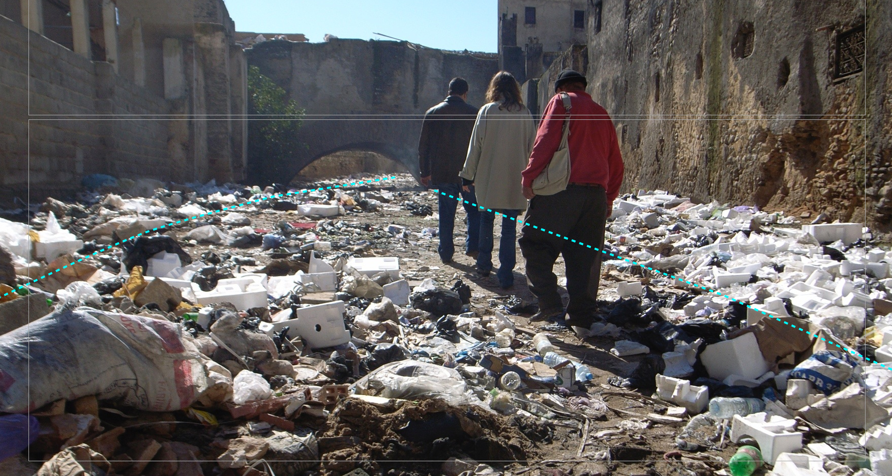 Before: A portion of the Fez river before uncovering, the concrete plaza being used as a dump. The blue marks indicate the locaation of the river. Image: Aziza Chaouni