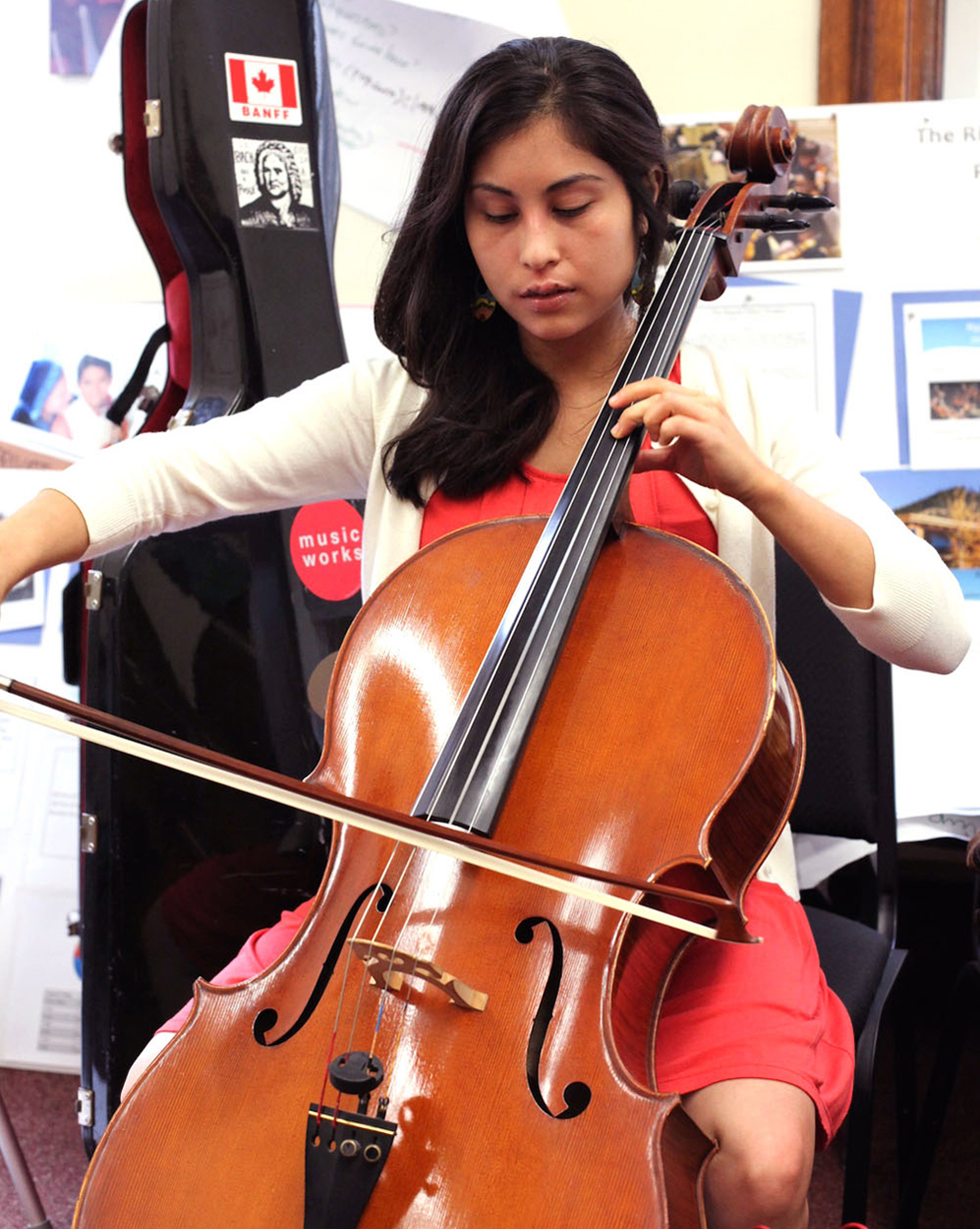 Andrea Landin doesn't just play beautiful music. A graduate of the Sistema Fellows US Program, she got the training she needed to teach children how music can change communities. Photo: Natasha Scripture