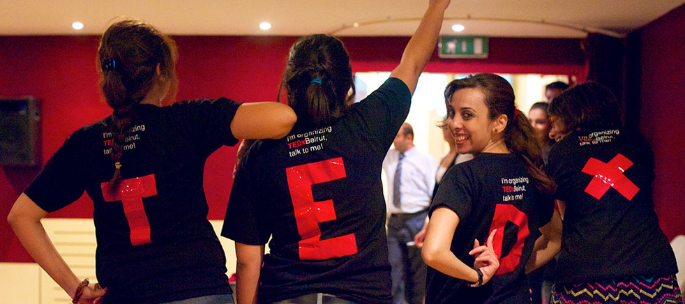 Organizers show off their shirts at a TEDxBeirutSalon. Photo: Courtesy of TEDxBeirut