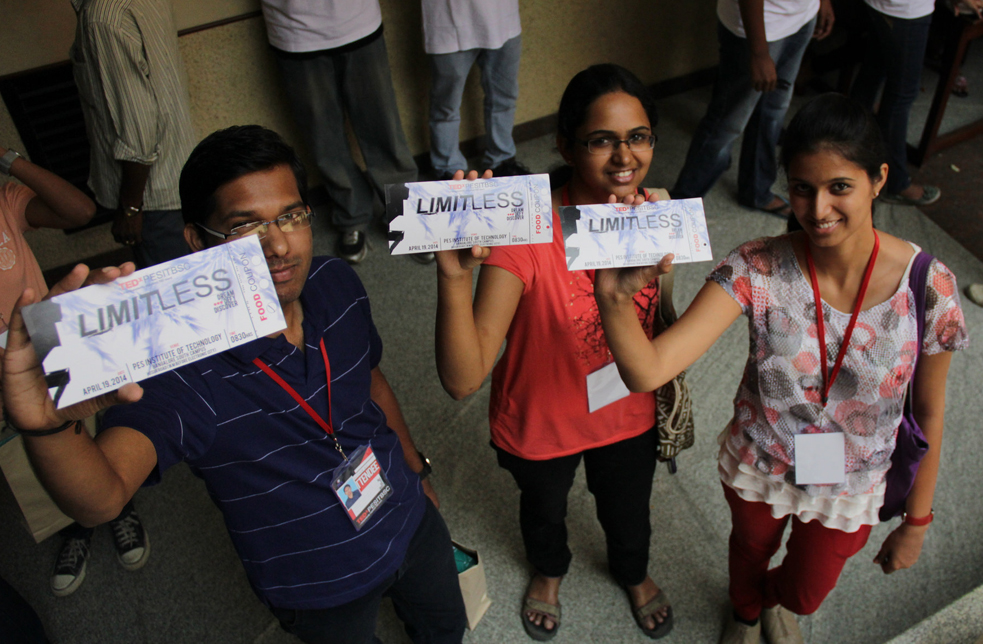 Students at PES Institute of Technology in Bangalore hold up their TEDx tickets. Photo: Courtesy of TEDxPESITBSC