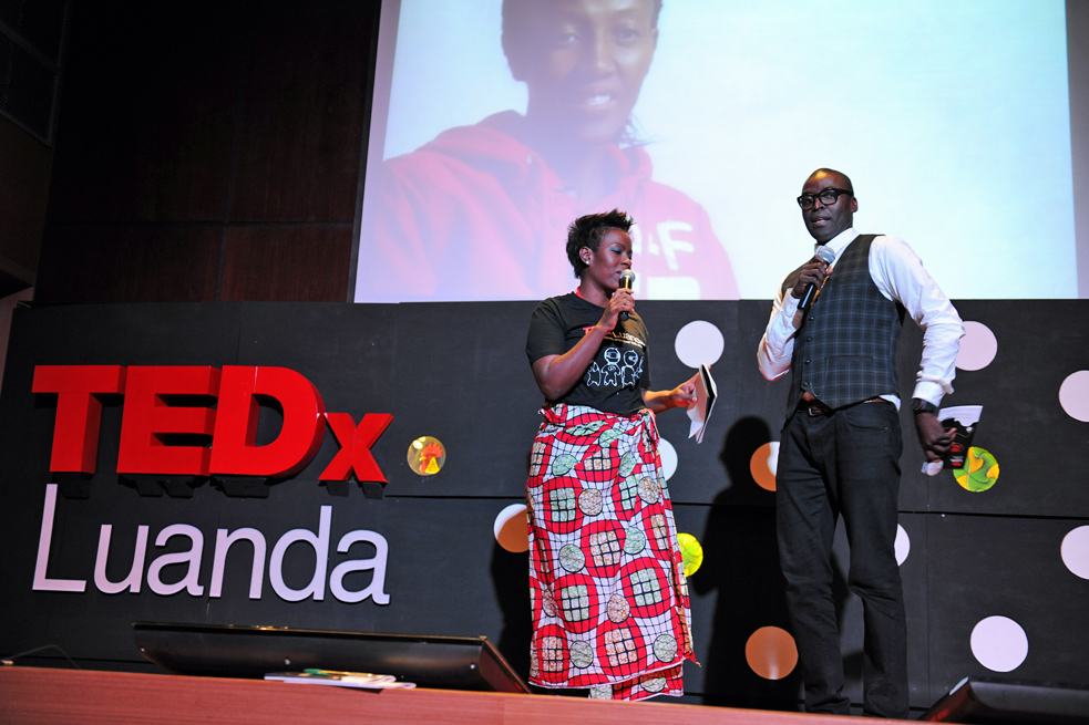 TEDxLuanda is the only event in the nation of Angola. Organizer Januario Jano (right) introduces the event with TK (left)