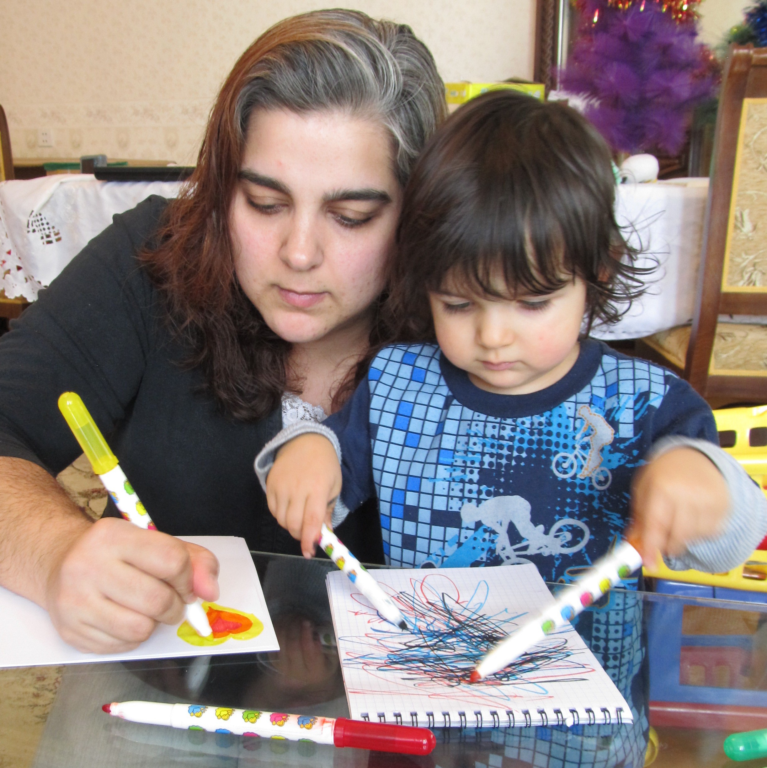 Alanna Shaikh enjoying drawing with her son. Photo: Alanna Shaikh 