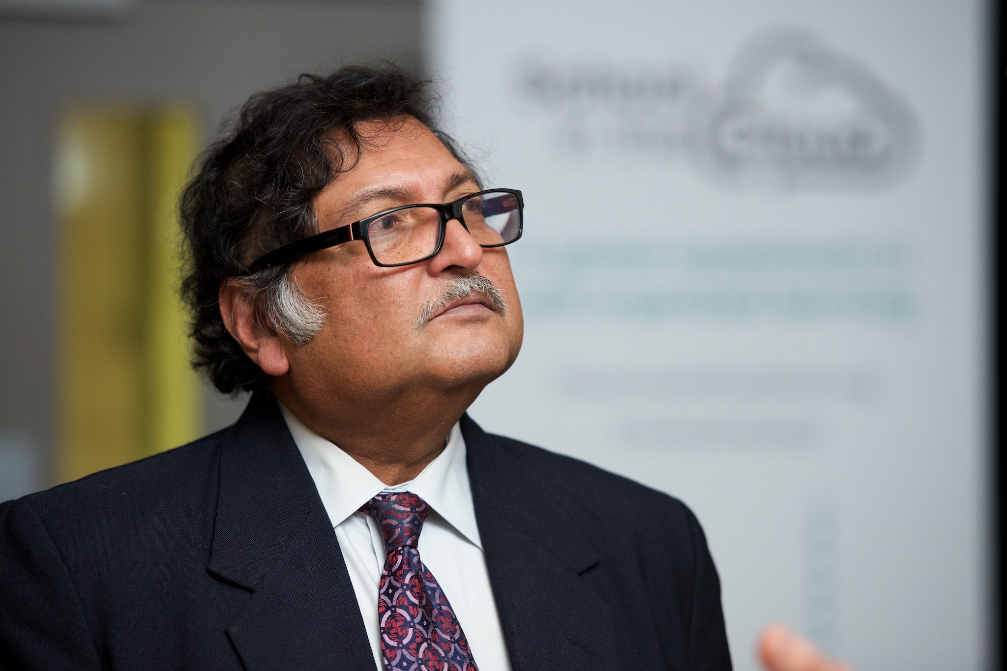 Sugata Mitra looks dreamily in the distance at the opening of SOLE Central. Photo: Alexander Wilson/Zander Photography
