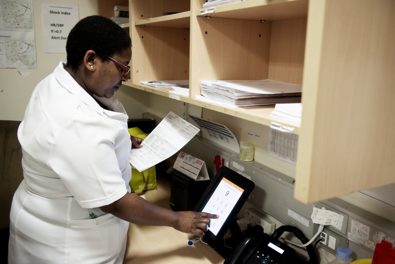 Nurse at Khayelitsha hospital, Cape Town, using the Mobile Triage App. Photo: Gregor Rohig 