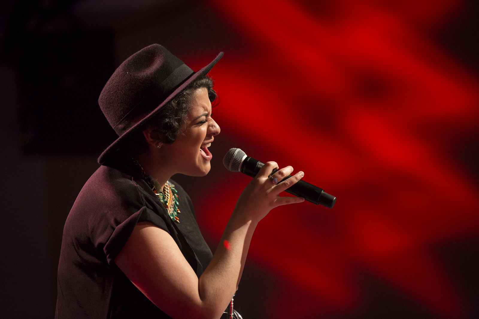 Linda Briceño shared the story of how she went from economics student to musician during Session 1 of TEDWomen 2015, before  bringing the room alive with her trumpet work and vocals. Photo: Marla Aufmuth/TED