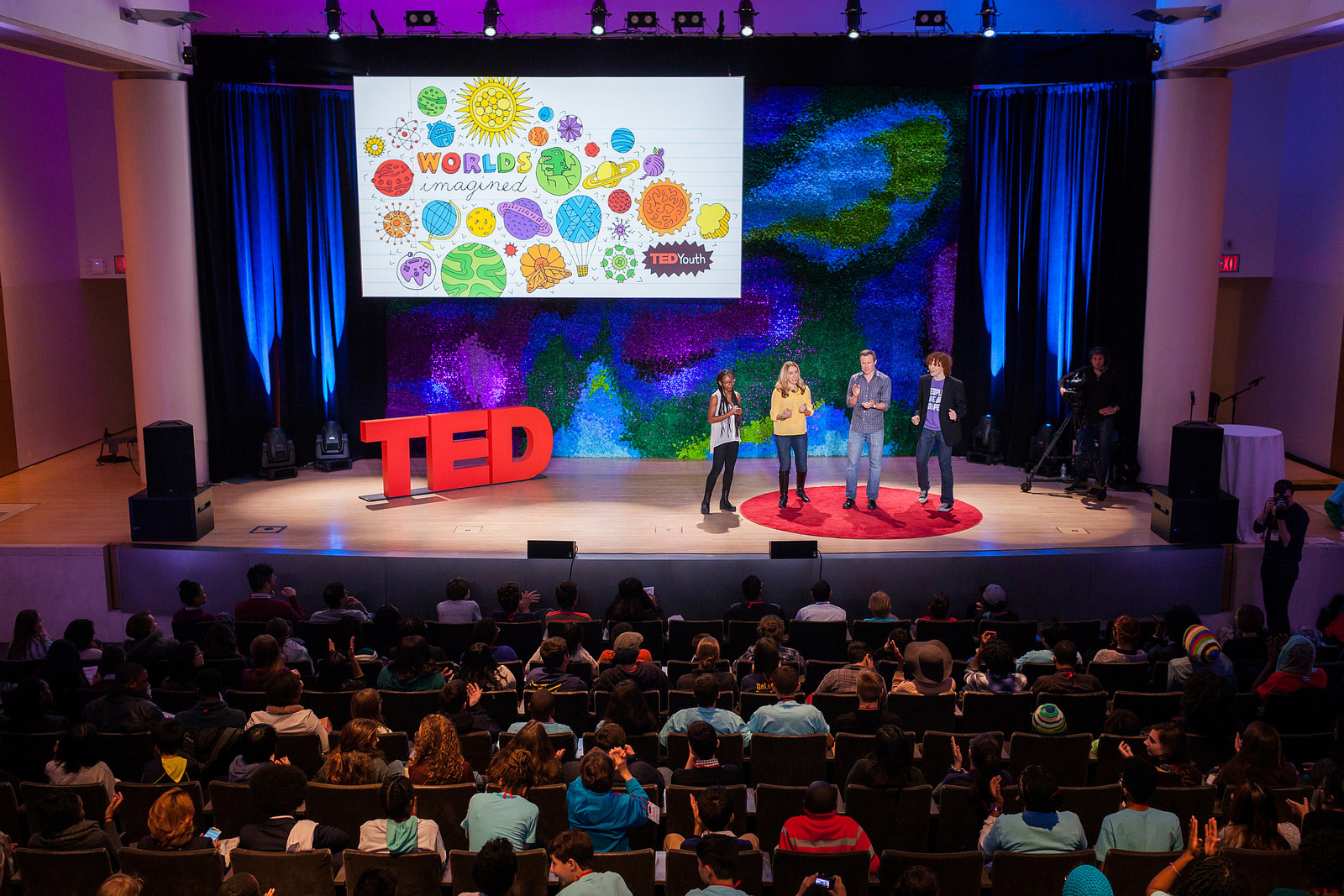Students get jobs to do at TEDYouth. In 2014, two teens joined hosts Kelly Stoetzel and Rives on stage to introduce each speaker. Photo: Ryan Lash/TED