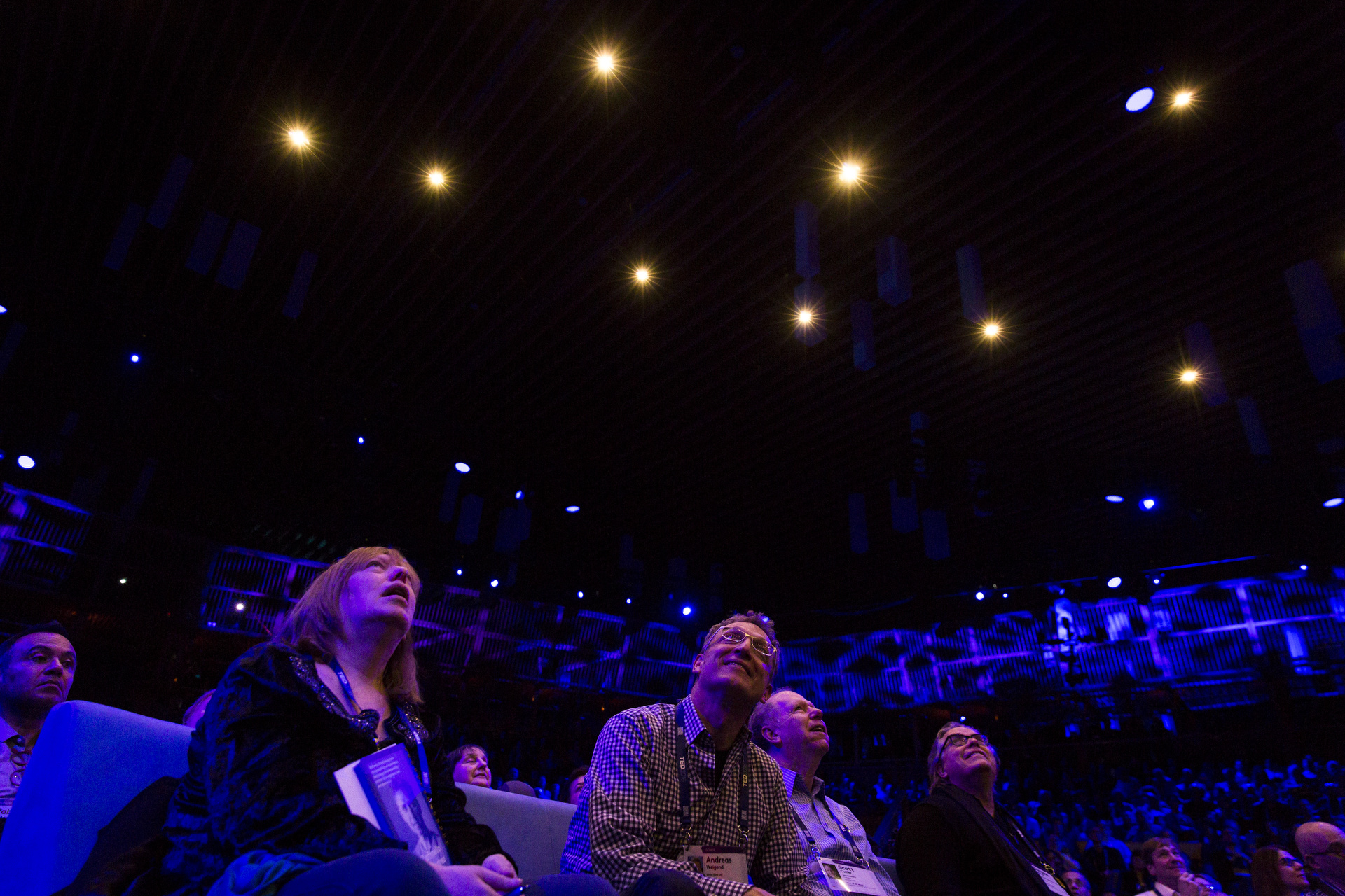 Attendees watch amazed as Raffaello D'Andrea's flying machines hover in swirls overhead. Photo: Bret Hartman / TED