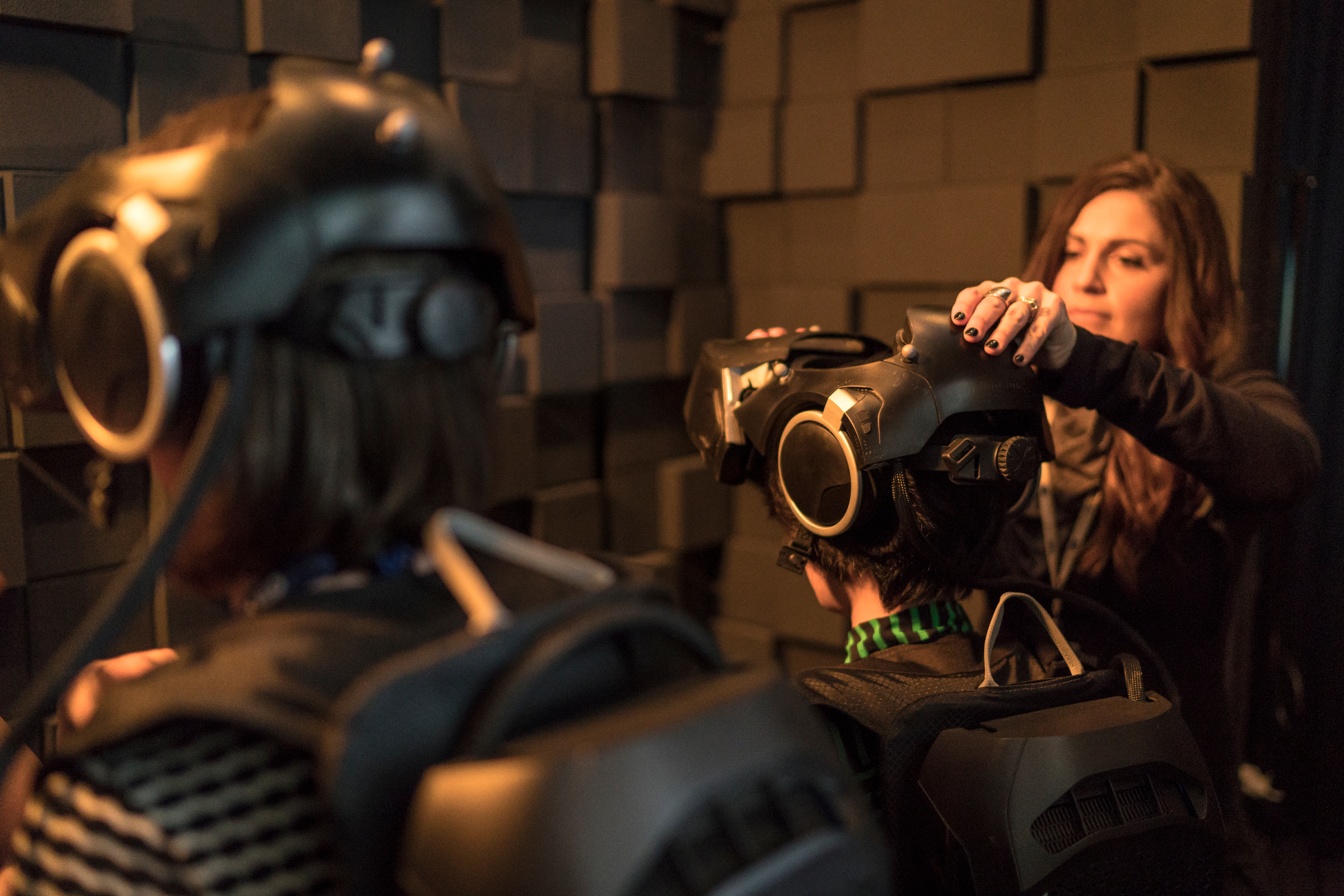 The writer gets fitted with gear for the virtual reality experience, The Void. Photo: Bret Hartman / TED