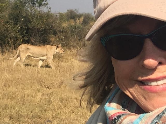 TEDWomen host Pat Mitchell shares this epic selfie along with a lion spotted at Great Plains.