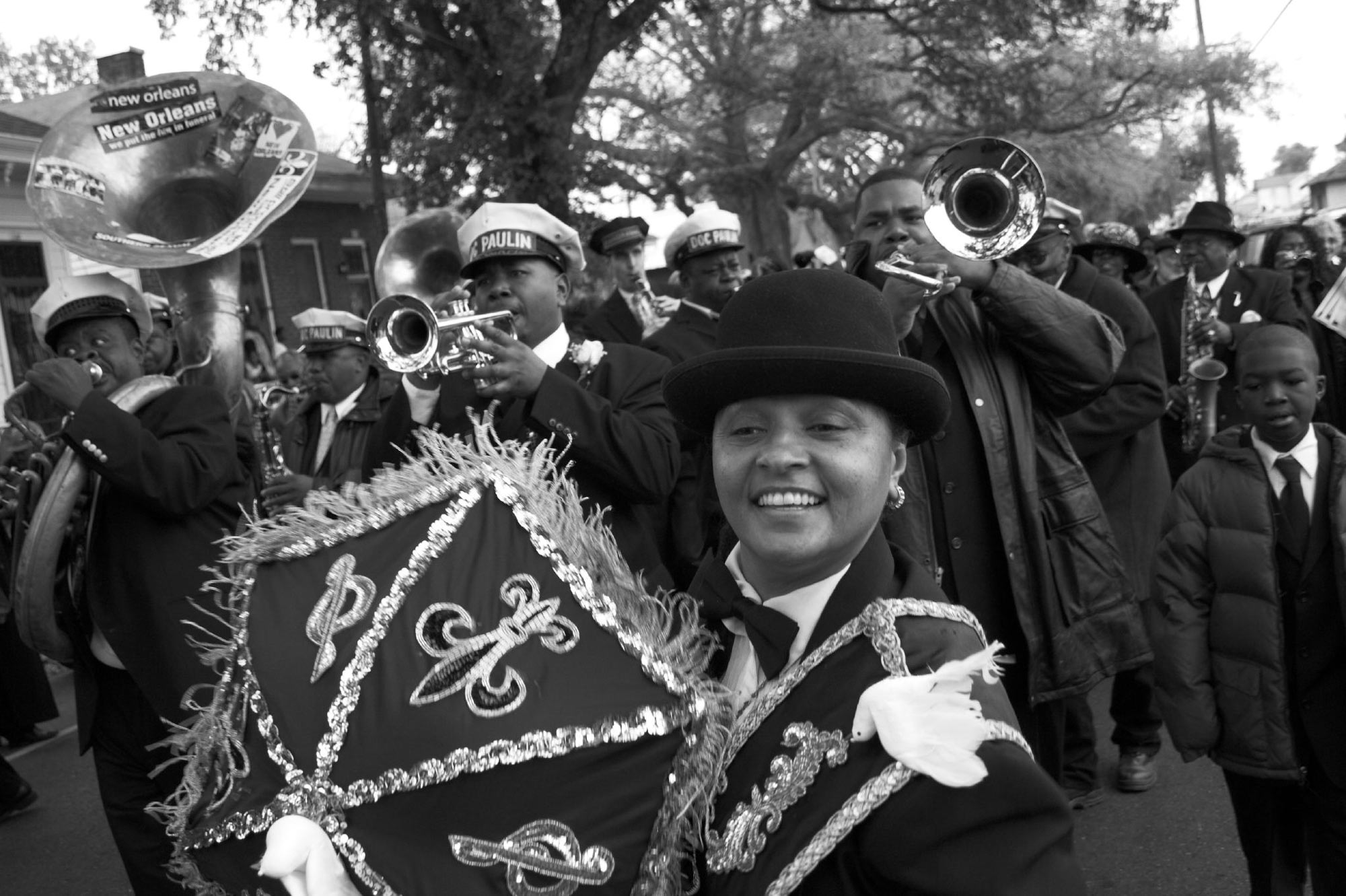 A jazz funeral in New Orleans is held for legendary jazz musician Doc Paulin who led many funerals in New Orleans with his trumpet. Photo by Derek Bridges.