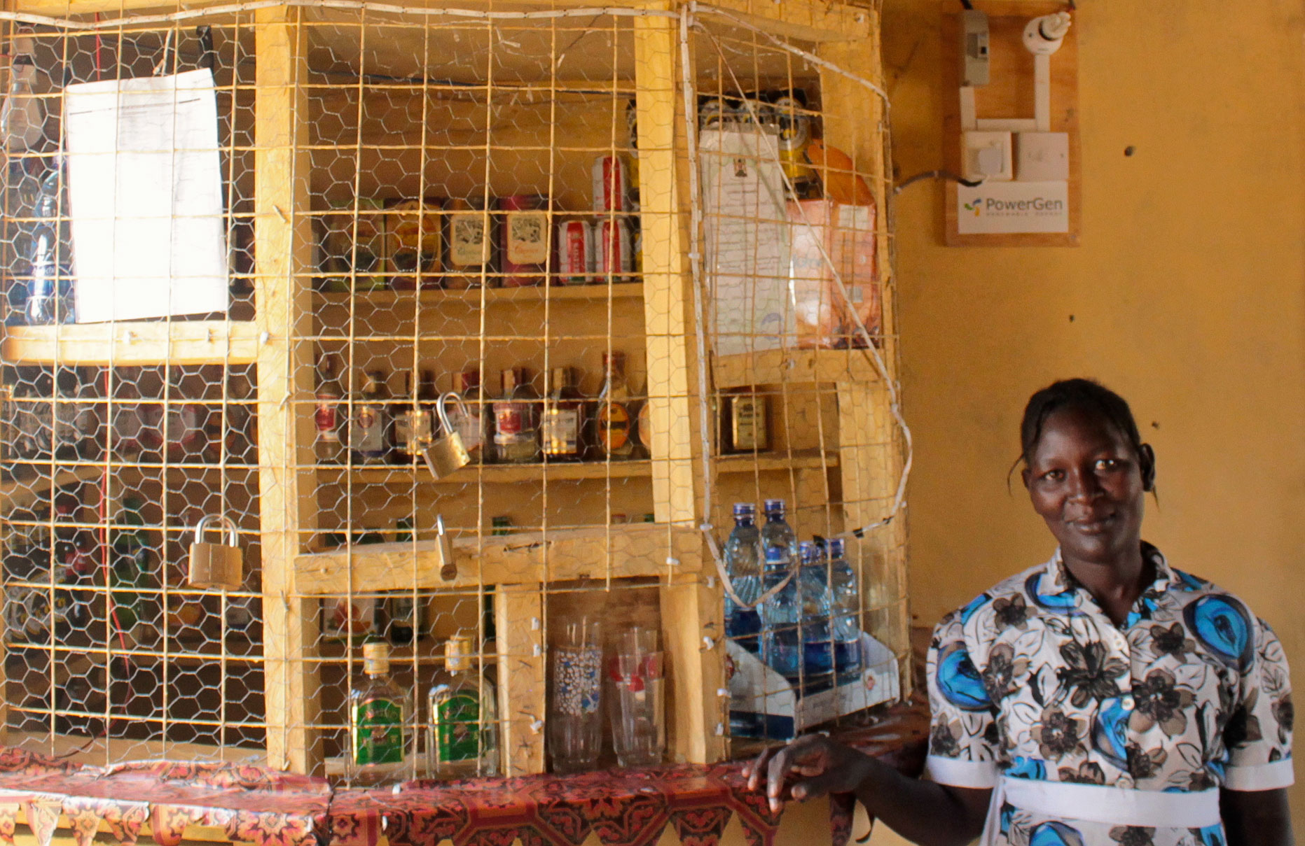 Lillian Muthoni owns a restaurant in Nkoilale; now hooked into the microgrid, she now pays about $22 a month for power. Previously she'd spent up to $130 on diesel for a generator. Photo by David Sengeh.