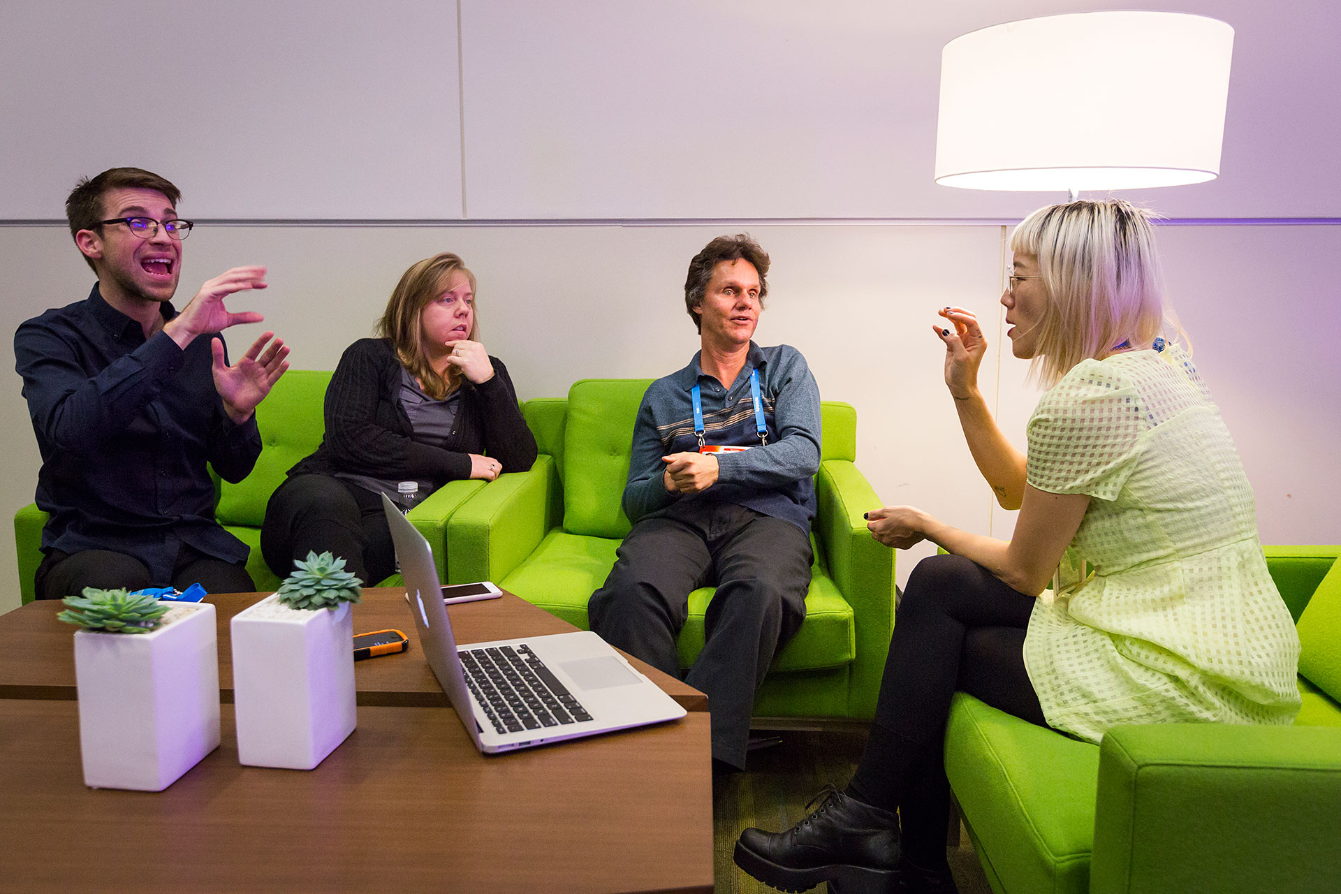 Christine Sun Kim, far right, in conversation with Daniel Kish, center right. The pair's conversation was translated into American Sign Language by Dylan Geil and Denise Kahler. Photo by Ryan Lash/TED.