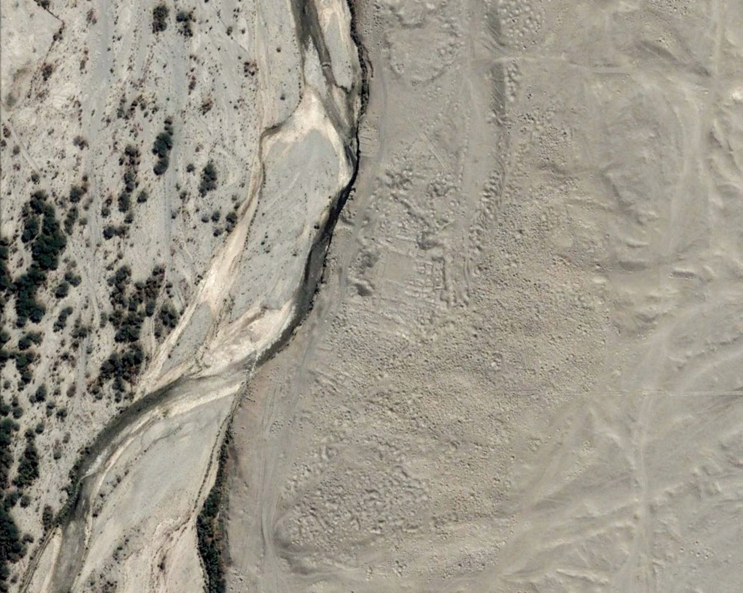 A looted town in the Nazca Dessert. Image copyright Digital Globe.